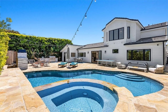 1954 Port Locksleigh Pl, Newport Beach, CA 92660 - view of swimming pool with an outdoor living space, a patio, and a pool with connected hot tub