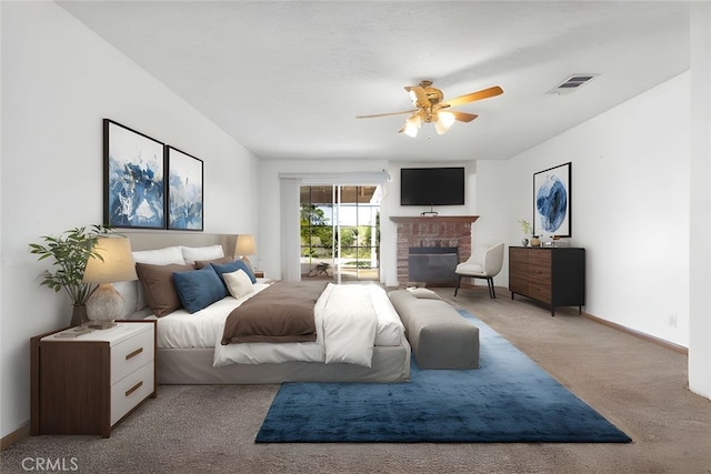 16912 Danbury Ave, Hesperia, CA 92345 - bedroom with carpet floors, a fireplace, access to exterior, and ceiling fan