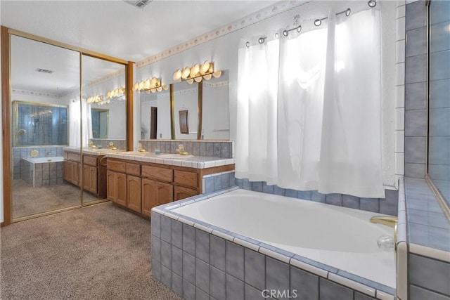 16912 Danbury Ave, Hesperia, CA 92345 - bathroom featuring a bath and vanity