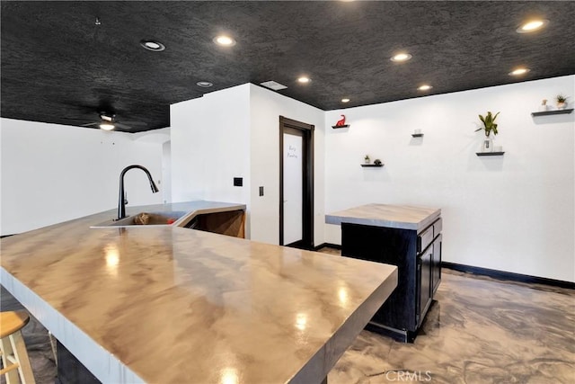 16912 Danbury Ave, Hesperia, CA 92345 - kitchen featuring a spacious island, dark cabinetry, recessed lighting, and ceiling fan
