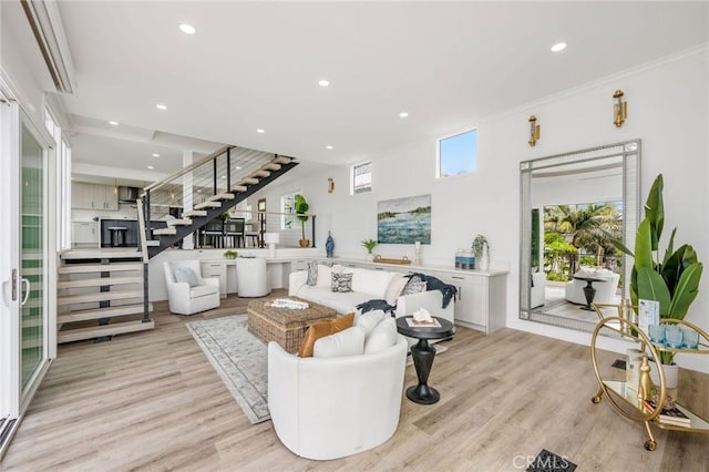 32015 Point Pl, Laguna Beach, CA 92651 - living area with stairway, light wood-style flooring, recessed lighting, and ornamental molding