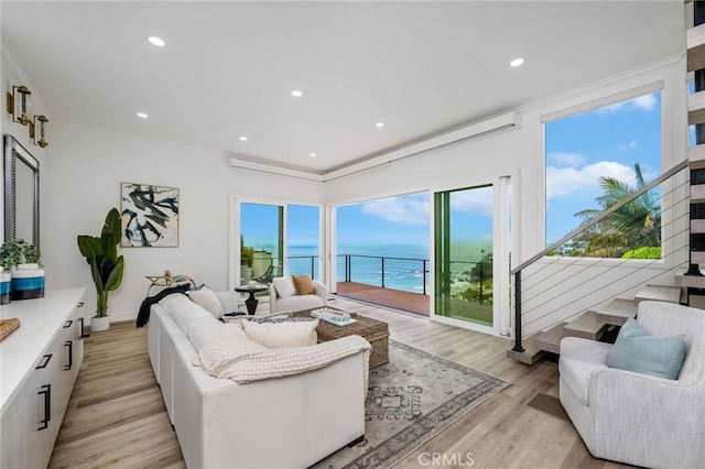 32015 Point Pl, Laguna Beach, CA 92651 - living area with light wood-style flooring, stairway, a water view, and recessed lighting