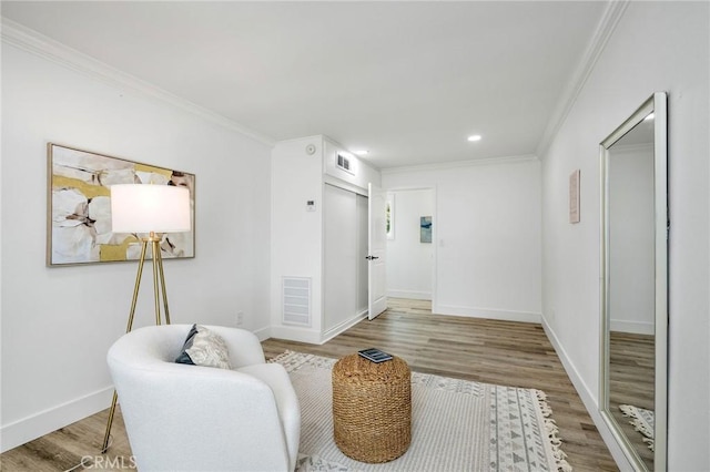32015 Point Pl, Laguna Beach, CA 92651 - living area with wood finished floors, crown molding, and recessed lighting