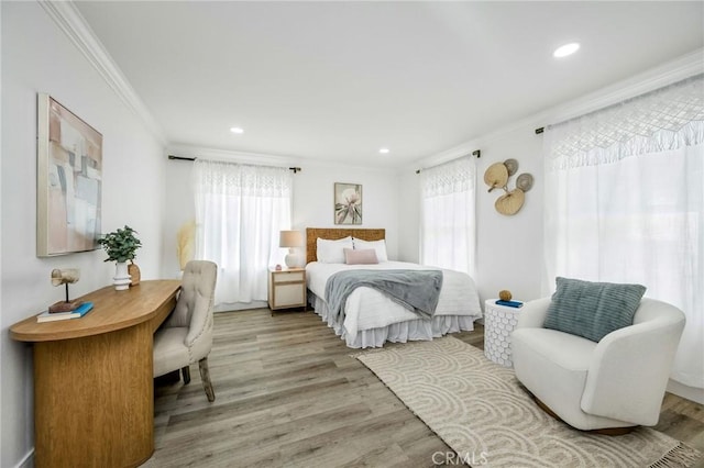 32015 Point Pl, Laguna Beach, CA 92651 - bedroom with crown molding, light wood-type flooring, recessed lighting, and an office area
