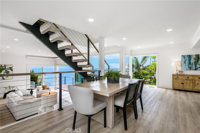 32015 Point Pl, Laguna Beach, CA 92651 - dining room with light wood-type flooring, ornamental molding, and recessed lighting