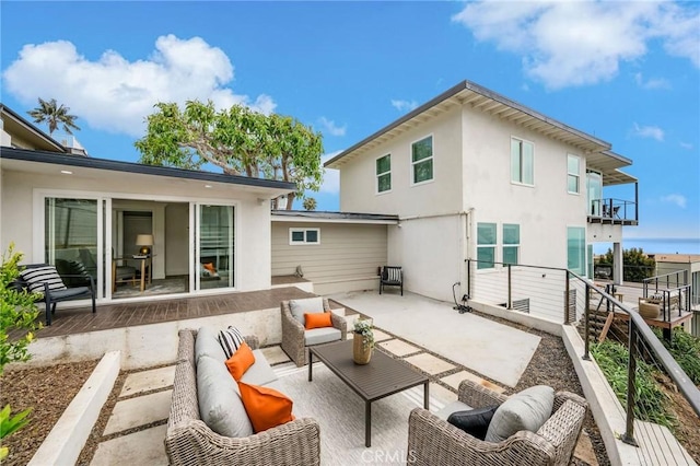 32015 Point Pl, Laguna Beach, CA 92651 - back of house featuring outdoor lounge area, stucco siding, and a patio area