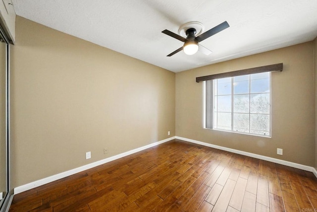 3078 Broadway Unit 210, San Diego, CA 92102 - empty room featuring dark wood-style flooring and ceiling fan