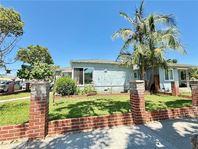 5901 California Ave, Long Beach, CA 90805 - view of front of property featuring stucco siding, a front lawn, and crawl space