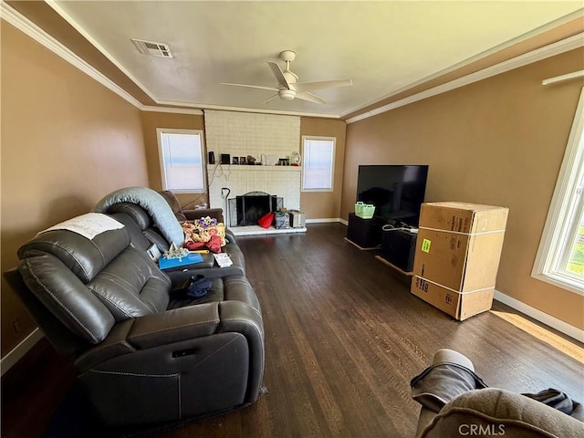 5901 California Ave, Long Beach, CA 90805 - living area featuring a ceiling fan, wood finished floors, ornamental molding, and a fireplace