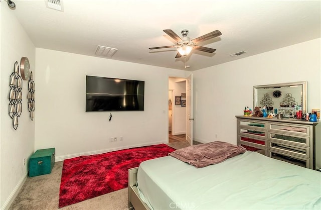 2698 N Arroyo Ave, Fresno, CA 93727 - carpeted bedroom with baseboards and ceiling fan