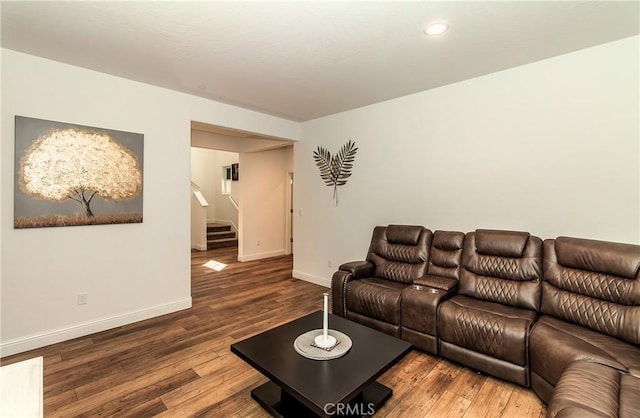 2698 N Arroyo Ave, Fresno, CA 93727 - living area featuring wood finished floors, stairway, and recessed lighting