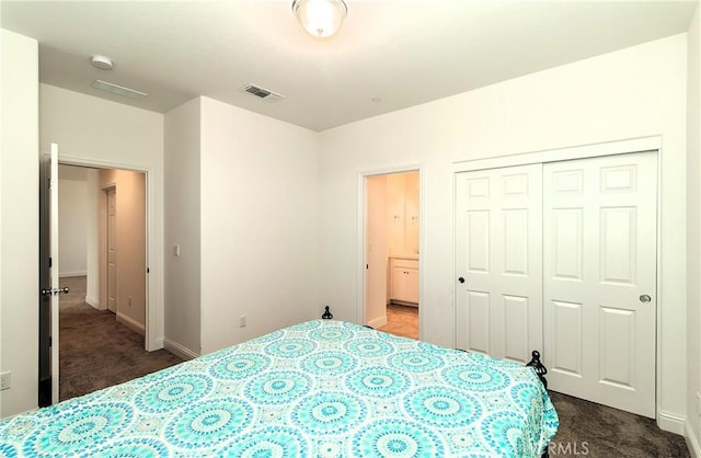 2698 N Arroyo Ave, Fresno, CA 93727 - carpeted bedroom with a closet and baseboards