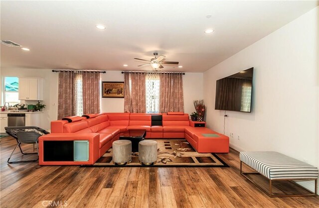 2698 N Arroyo Ave, Fresno, CA 93727 - living room with plenty of natural light, a ceiling fan, recessed lighting, and wood finished floors