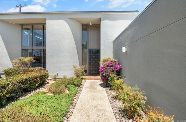3112 N Mountain View Dr, San Diego, CA 92116 - doorway to property featuring stucco siding