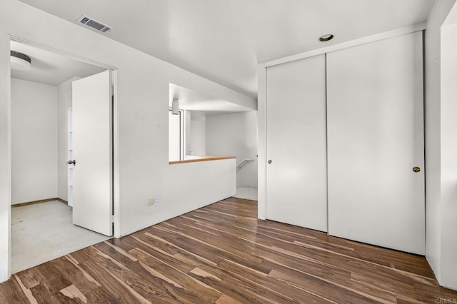 3112 N Mountain View Dr, San Diego, CA 92116 - unfurnished bedroom featuring wood finished floors and a closet