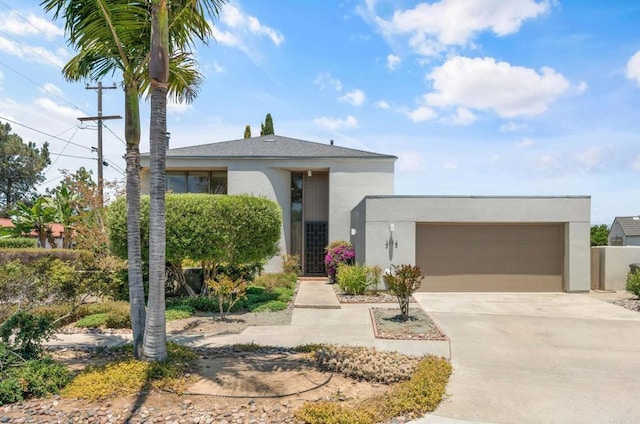 3112 N Mountain View Dr, San Diego, CA 92116 - view of front of home with driveway, stucco siding, and an attached garage
