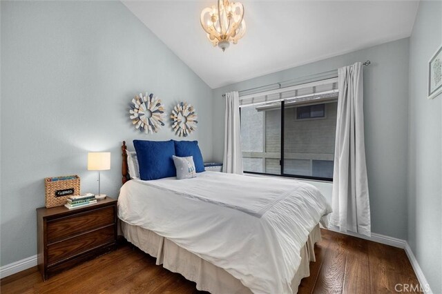 220 S Prospect Ave Unit 9, Redondo Beach, CA 90277 - bedroom featuring lofted ceiling, a chandelier, and wood finished floors