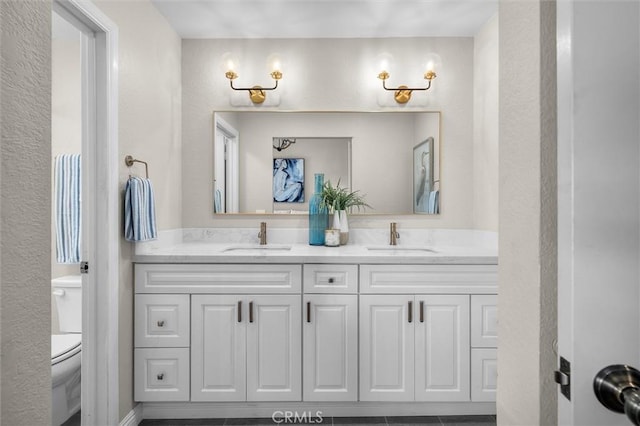 220 S Prospect Ave Unit 9, Redondo Beach, CA 90277 - full bathroom featuring double vanity and a textured wall