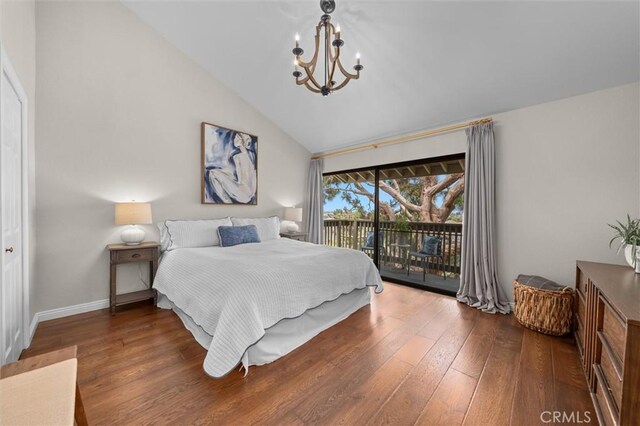 220 S Prospect Ave Unit 9, Redondo Beach, CA 90277 - bedroom featuring access to outside, a chandelier, hardwood / wood-style floors, and vaulted ceiling