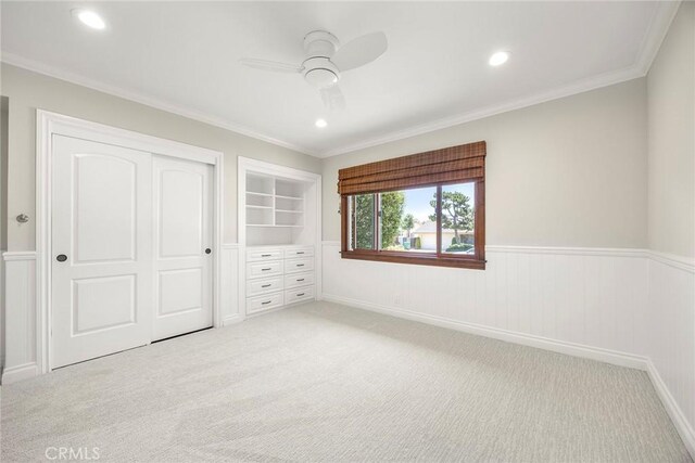 1831 Cockscrow Ln, North Tustin, CA 92705 - unfurnished bedroom featuring light colored carpet, a closet, wainscoting, recessed lighting, and ornamental molding