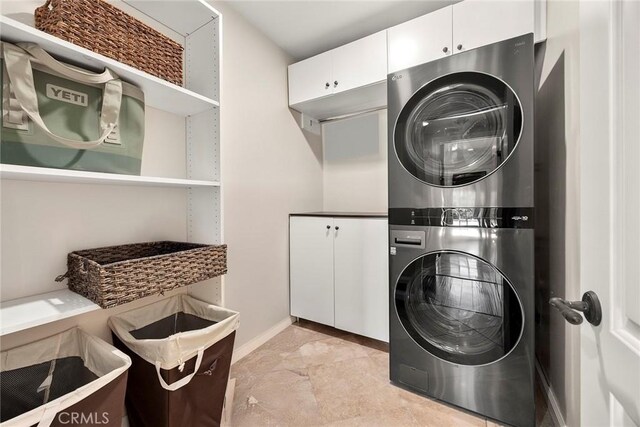 1831 Cockscrow Ln, North Tustin, CA 92705 - laundry area with stacked washer / drying machine and cabinet space