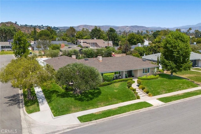 1831 Cockscrow Ln, North Tustin, CA 92705 - view of front of property with a front yard, a residential view, a mountain view, and a chimney