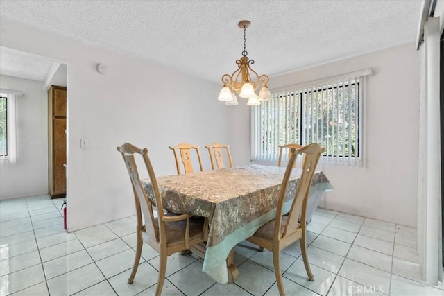406 Genoa St Unit A, Monrovia, CA 91016 - dining space with a textured ceiling, a chandelier, and light tile patterned flooring
