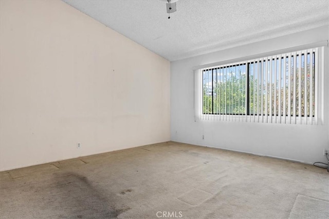 406 Genoa St Unit A, Monrovia, CA 91016 - spare room featuring carpet, a textured ceiling, and a ceiling fan
