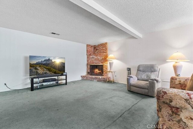 406 Genoa St Unit A, Monrovia, CA 91016 - living room with carpet flooring, a textured ceiling, a brick fireplace, and beamed ceiling