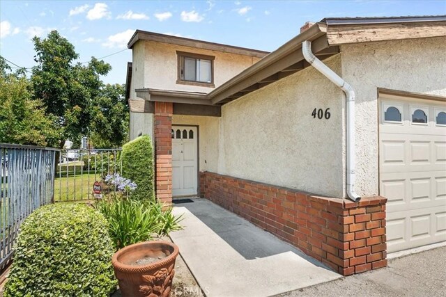 406 Genoa St Unit A, Monrovia, CA 91016 - property entrance with stucco siding and brick siding
