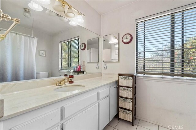 406 Genoa St Unit A, Monrovia, CA 91016 - bathroom featuring tile patterned floors, vanity, and curtained shower