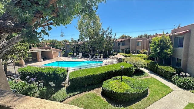 13722 Red Hill Ave Unit 20, Tustin, CA 92780 - community pool featuring a patio