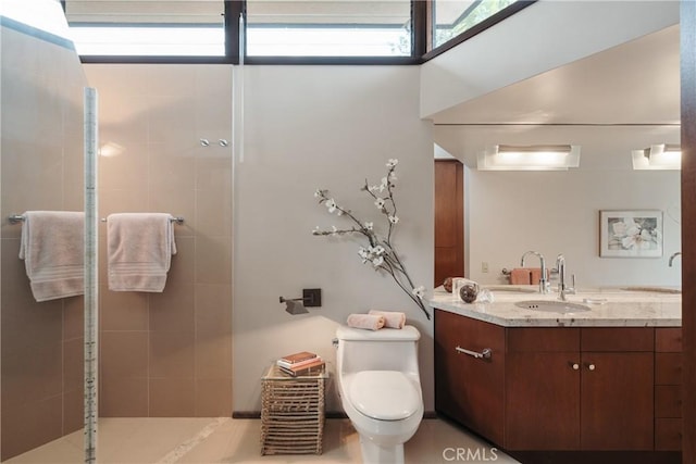 1501 Clearview Ln, North Tustin, CA 92705 - bathroom with tiled shower, vanity, and a skylight