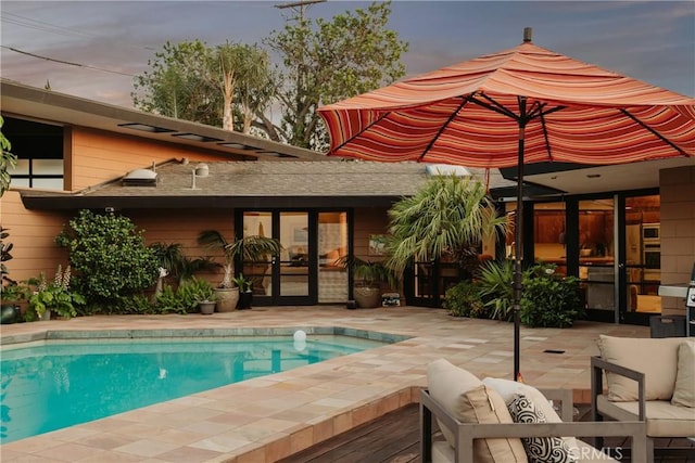 1501 Clearview Ln, North Tustin, CA 92705 - swimming pool with french doors, an outdoor hangout area, and a patio area