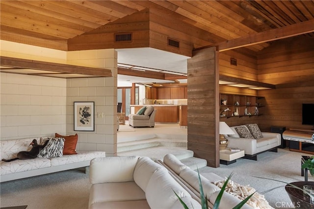 1501 Clearview Ln, North Tustin, CA 92705 - living room with wooden ceiling, carpet floors, wooden walls, concrete block wall, and high vaulted ceiling