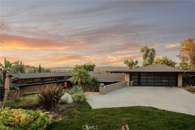 1501 Clearview Ln, North Tustin, CA 92705 - yard at dusk featuring a detached garage