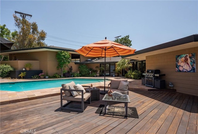 1501 Clearview Ln, North Tustin, CA 92705 - view of swimming pool featuring a deck, a grill, and an outdoor hangout area