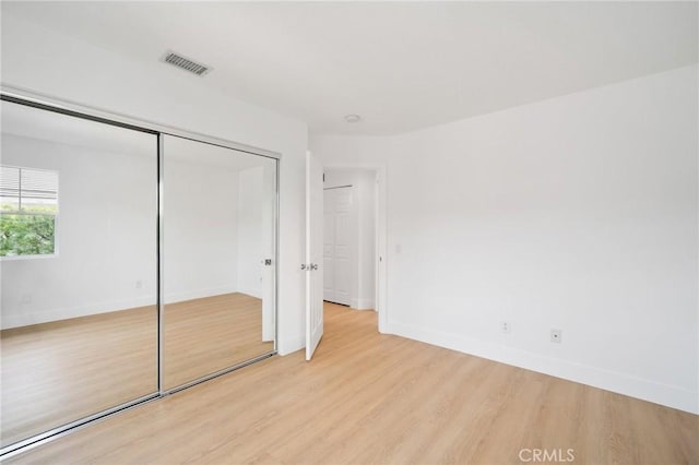 7 Gatewood Dr, Aliso Viejo, CA 92656 - unfurnished bedroom featuring light wood finished floors and a closet