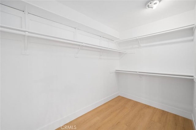 7 Gatewood Dr, Aliso Viejo, CA 92656 - walk in closet featuring light wood-style floors