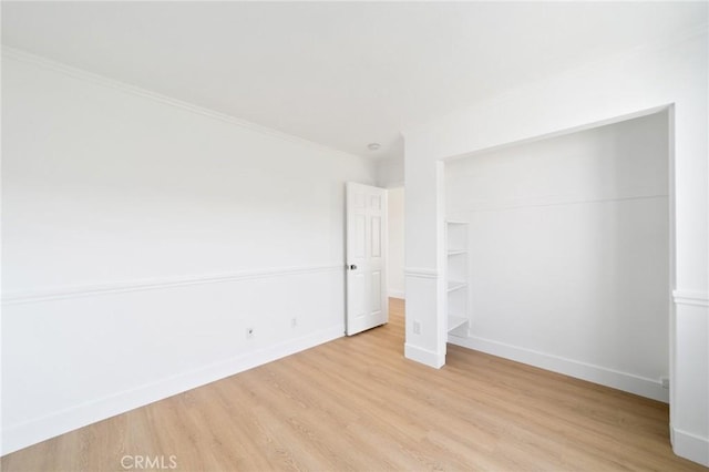 7 Gatewood Dr, Aliso Viejo, CA 92656 - unfurnished bedroom featuring light wood finished floors, a closet, and crown molding
