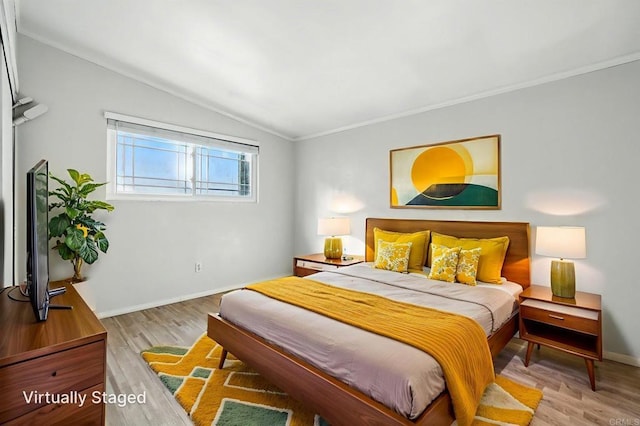 10150 Sierra Madre Rd, Spring Valley, CA 91977 - bedroom featuring lofted ceiling, wood finished floors, and ornamental molding
