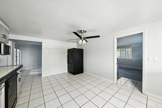 10150 Sierra Madre Rd, Spring Valley, CA 91977 - unfurnished living room featuring a ceiling fan and light tile patterned flooring