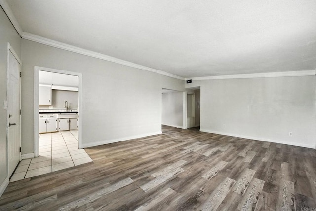 10150 Sierra Madre Rd, Spring Valley, CA 91977 - unfurnished living room with wood finished floors and crown molding