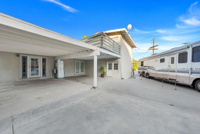 10150 Sierra Madre Rd, Spring Valley, CA 91977 - view of patio / terrace featuring french doors and a carport