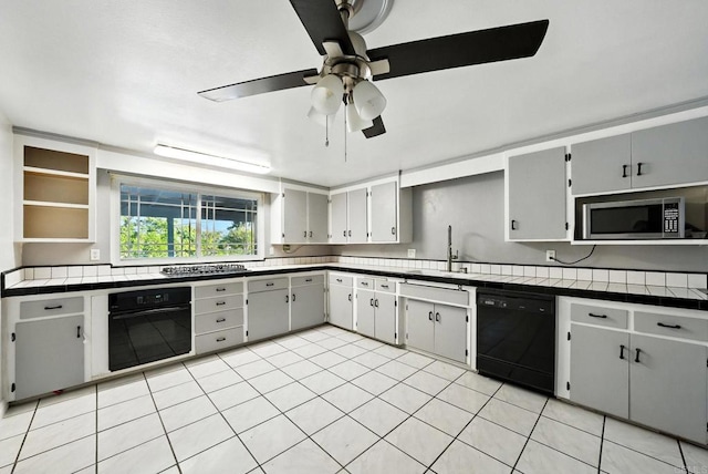10150 Sierra Madre Rd, Spring Valley, CA 91977 - kitchen with black appliances, ceiling fan, open shelves, tile counters, and light tile patterned floors
