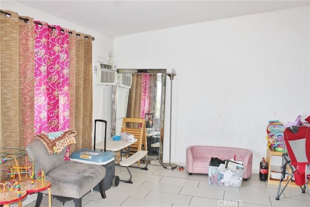 10343 Amherst Ave, Montclair, CA 91763 - living area featuring a wall unit AC and tile patterned floors