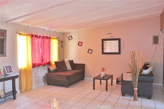 10343 Amherst Ave, Montclair, CA 91763 - living room with light tile patterned floors, a textured ceiling, and beamed ceiling