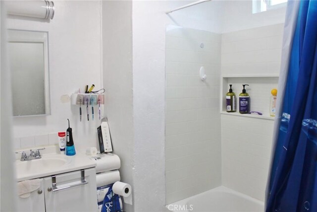 10343 Amherst Ave, Montclair, CA 91763 - full bathroom featuring shower / bathtub combination with curtain and vanity