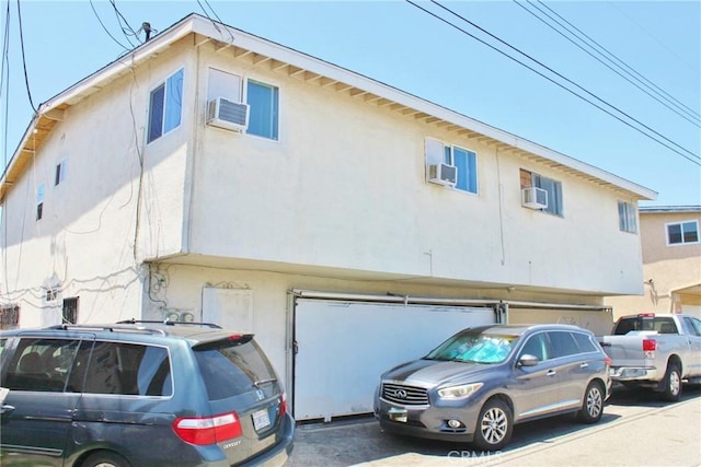 10343 Amherst Ave, Montclair, CA 91763 - view of front facade with stucco siding and a garage