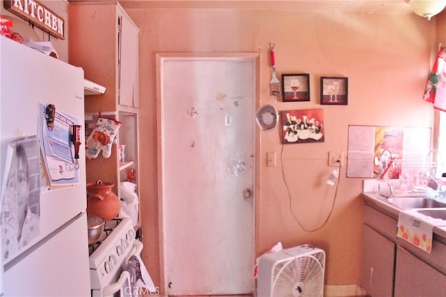 10343 Amherst Ave, Montclair, CA 91763 - kitchen featuring refrigerator and a sink